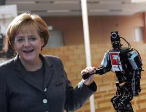 Robot Bruno welcomes German Chancelor Angela Merkel at the booth of the TU-Darmstadt at the German IT summit 2008.